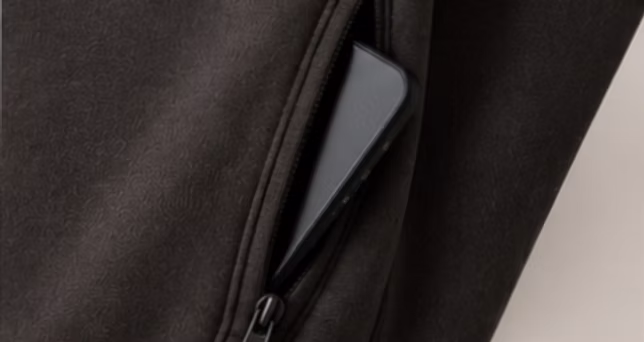 Phone in the concealed zip pocket